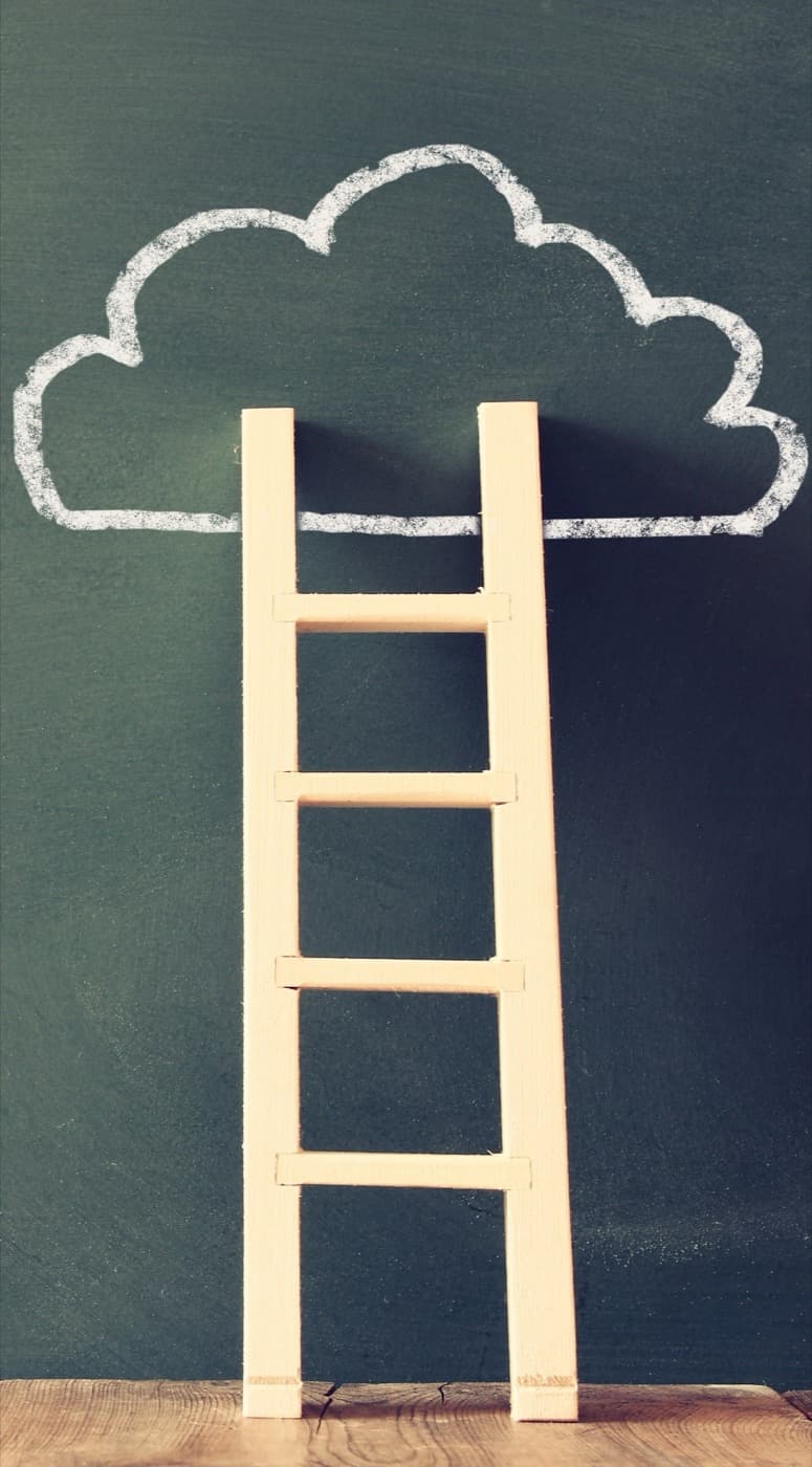 Chalkboard with a ladder reaching a cloud
